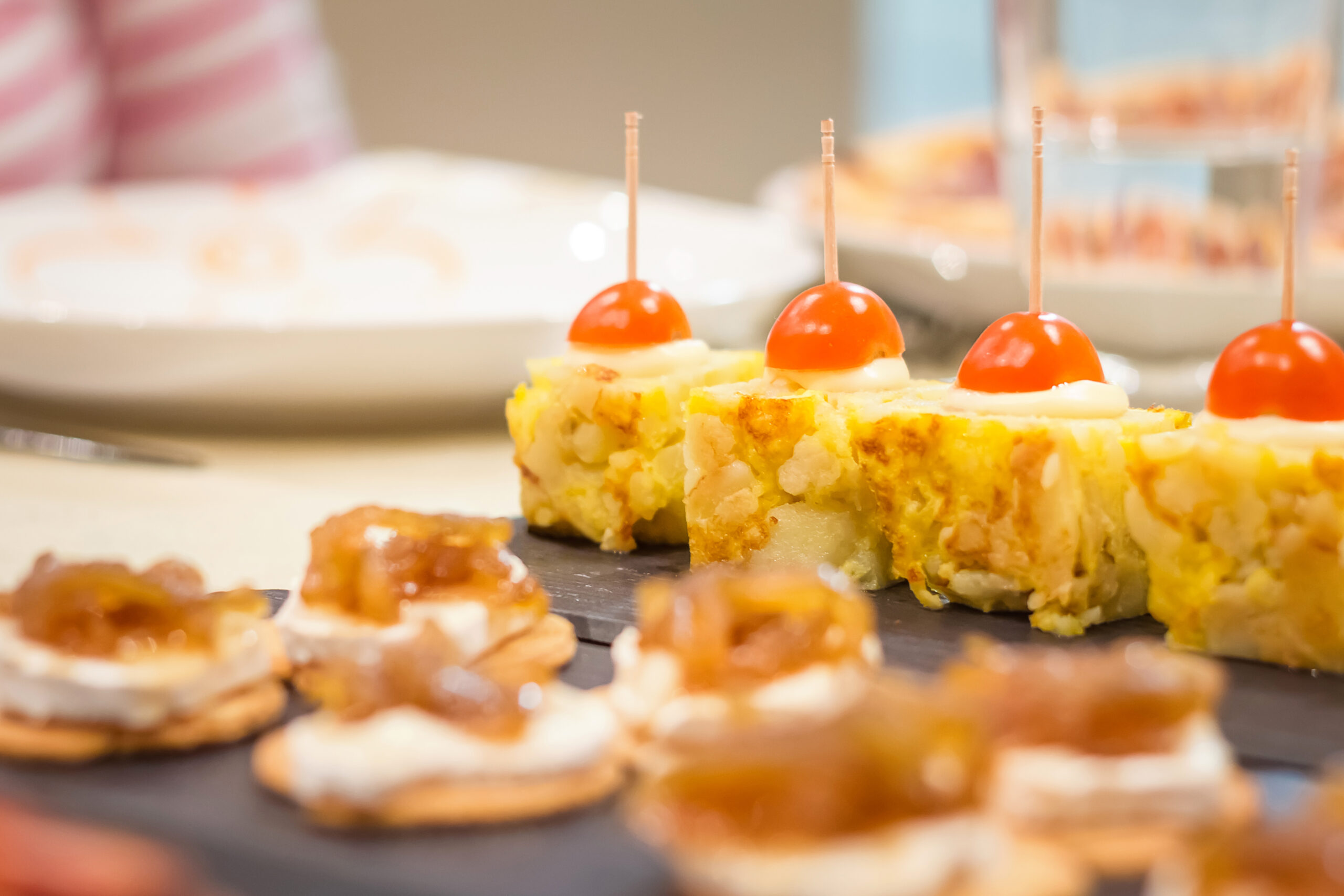 Spanish omelet tapas and cheese with onion pinchos